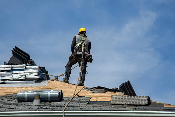 Professional Roofing technician working in Wading River, NY
